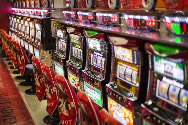 Live dealer at kodejitu4d Sic Bo table with dice visible in multiple camera angles
